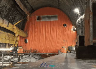 TELT / Construction du Tunnel Lyon-Turin / Tunnel EURALPIN : fabrication sur mesure en France à Orléans, et installation par nos soins d'un bouchon de tunnel pour la protection contre la poussière et les débris, une isolation acoustique et une grande résistance.